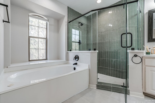 15110 Grayoak Frst, San Antonio, TX 78248 - bathroom featuring tile patterned flooring, a stall shower, and a garden tub