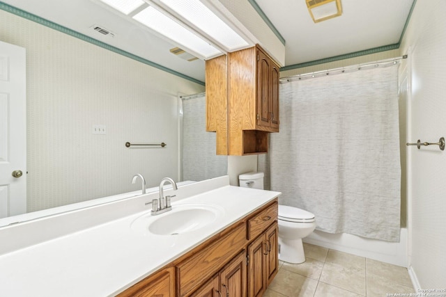 full bathroom with tile patterned floors, visible vents, toilet, and vanity