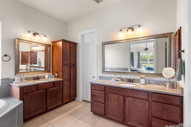 13606 Beck Ml, San Antonio, TX 78253 - ensuite bathroom with two vanities, connected bathroom, tile patterned flooring, and a sink