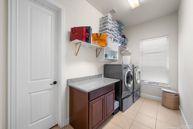 13606 Beck Ml, San Antonio, TX 78253 - laundry area with light tile patterned floors, baseboards, visible vents, laundry area, and washer and clothes dryer