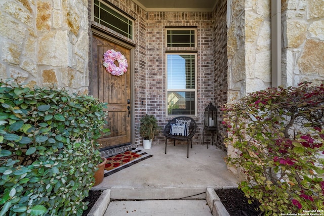 13606 Beck Ml, San Antonio, TX 78253 - doorway to property with a porch, brick siding, and stone siding