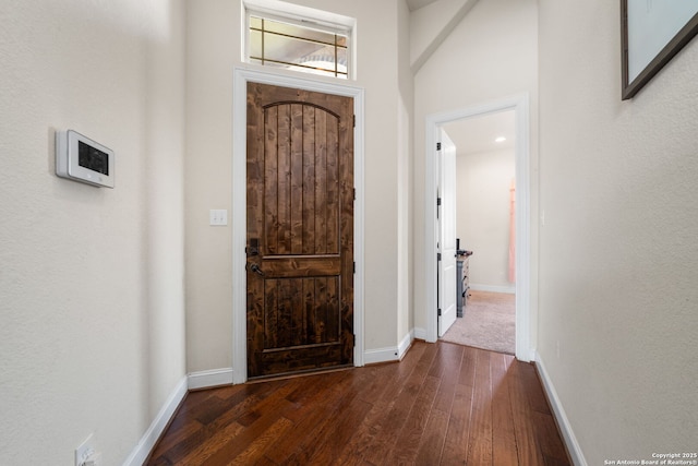 13606 Beck Ml, San Antonio, TX 78253 - foyer featuring baseboards and dark wood-type flooring