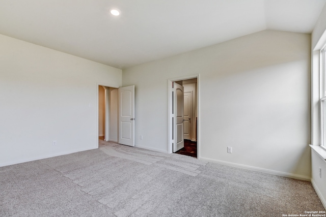 14914 Telfaire Mdw, Von Ormy, TX 78073 - unfurnished bedroom featuring lofted ceiling, recessed lighting, baseboards, and carpet floors