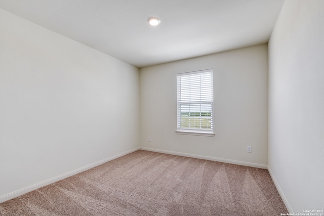 14914 Telfaire Mdw, Von Ormy, TX 78073 - carpeted spare room with baseboards