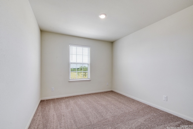 14914 Telfaire Mdw, Von Ormy, TX 78073 - carpeted spare room featuring baseboards