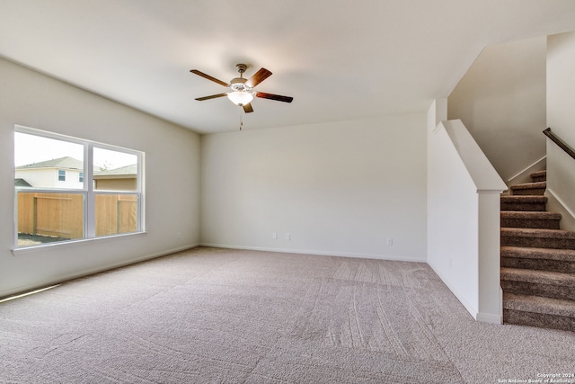 14914 Telfaire Mdw, Von Ormy, TX 78073 - carpeted spare room featuring stairway, baseboards, and ceiling fan