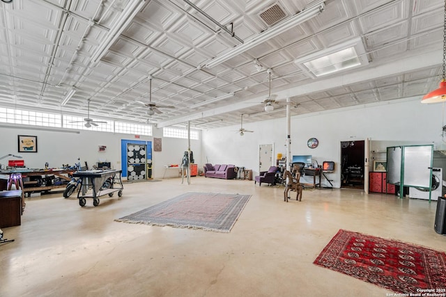 1651 W Woodlawn, San Antonio, TX 78201 - misc room featuring a ceiling fan, visible vents, and concrete flooring