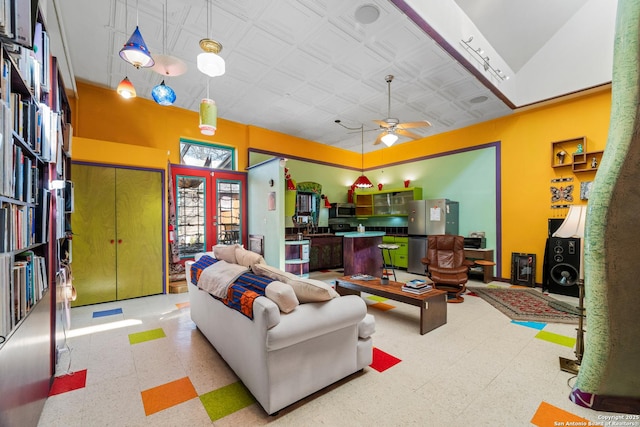 1651 W Woodlawn, San Antonio, TX 78201 - living room featuring tile patterned floors, french doors, baseboards, and ceiling fan