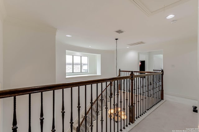 hallway featuring carpet floors, recessed lighting, an upstairs landing, and attic access