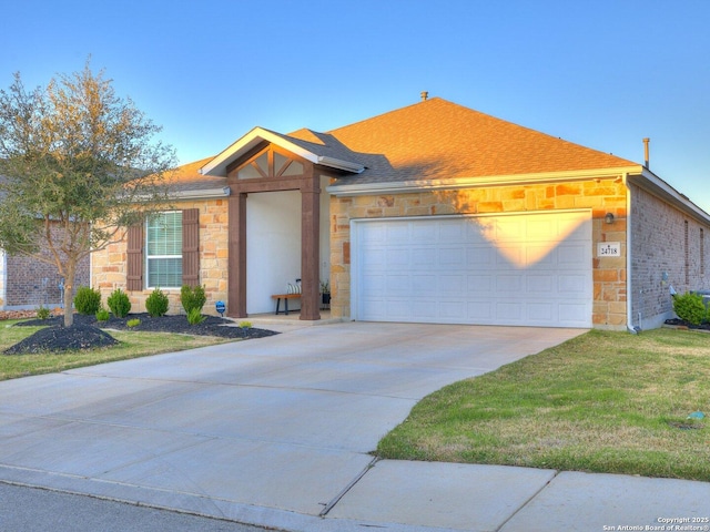 view of front of house with a front lawn, driveway, stone siding, and a garage