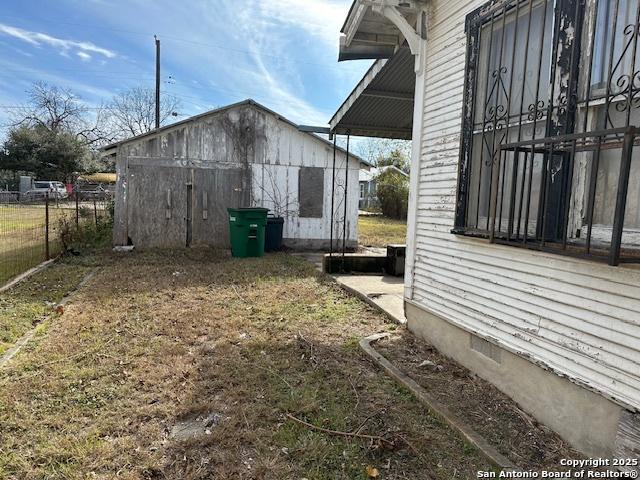 632 Canton, San Antonio, TX 78202 - view of property exterior featuring an outdoor structure and fence