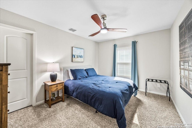 9314 Nubuck, Converse, TX 78109 - bedroom with light carpet, baseboards, and a ceiling fan