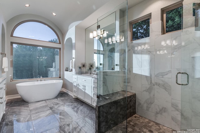 21335 Rembrandt, San Antonio, TX 78256 - full bath featuring a shower stall, vaulted ceiling, a soaking tub, marble finish floor, and vanity