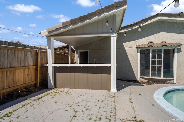 view of patio with fence