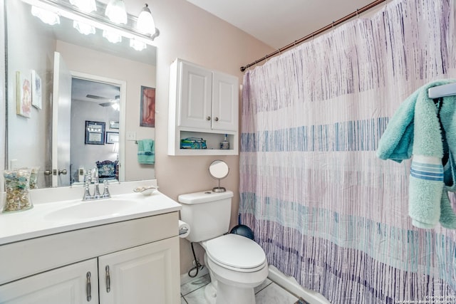 12938 Ocean Glade, San Antonio, TX 78249 - bathroom featuring ceiling fan, toilet, a shower with shower curtain, and vanity