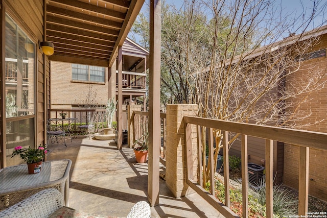 8633 Datapoint Unit 227, San Antonio, TX 78229 - view of patio with a balcony and central air condition unit