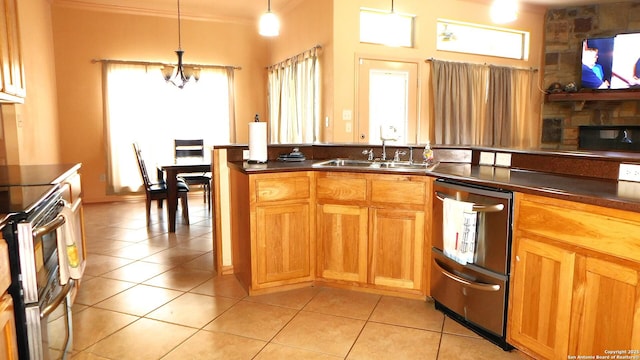 kitchen with dark countertops, light tile patterned floors, and double oven range