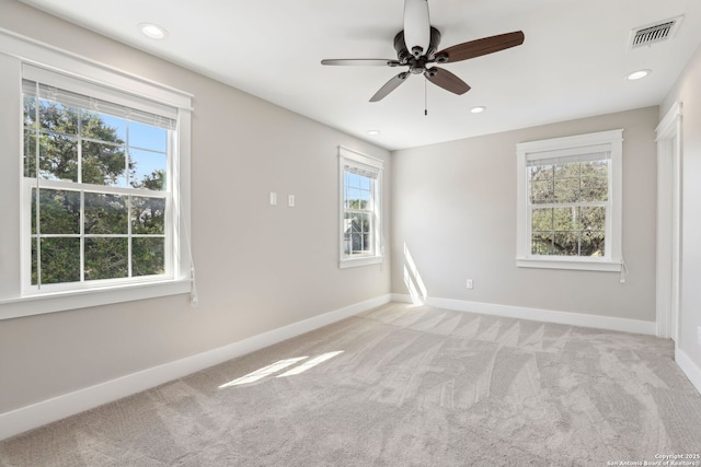 295 S E Ave, New Braunfels, TX 78130 - empty room with light colored carpet, baseboards, ceiling fan, and recessed lighting