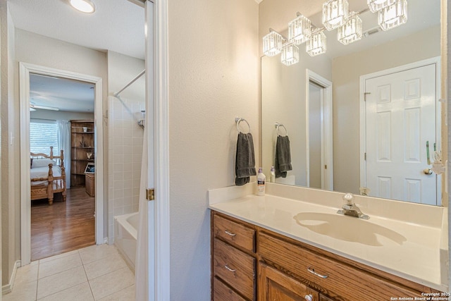191 Campfire Cir, Fredericksburg, TX 78624 - bathroom with tile patterned flooring, vanity, and shower / washtub combination