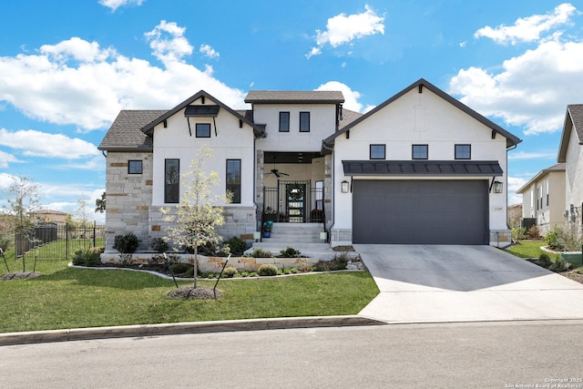 view of front facade featuring concrete driveway, stucco siding, fence, stone siding, and a front yard