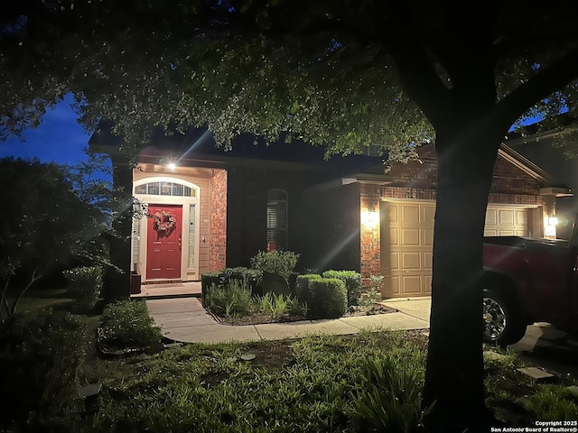 view of front of property with a garage