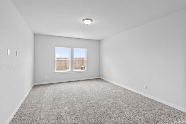 2074 Newforest Peak, New Braunfels, TX 78130 - spare room with carpet flooring and baseboards