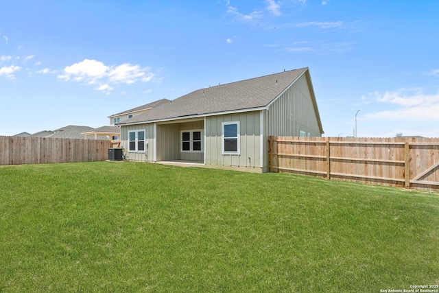 2074 Newforest Peak, New Braunfels, TX 78130 - rear view of house featuring board and batten siding, a shingled roof, central AC, and a patio