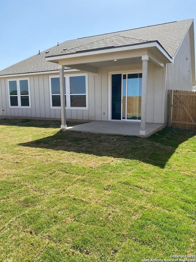 2059 Newforest Peak, New Braunfels, TX 78130 - back of property featuring board and batten siding, a patio area, and roof with shingles