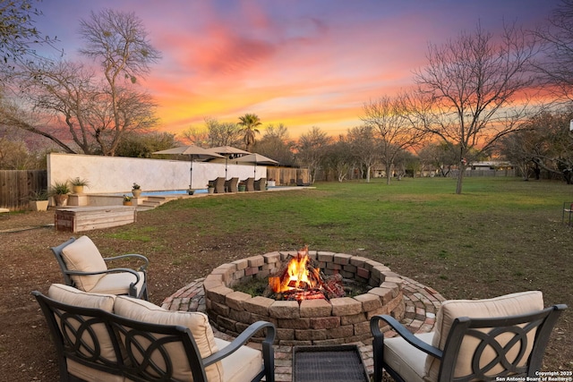 262 Rockhill Dr, San Antonio, TX 78209 - view of yard featuring fence, an outdoor fire pit, and a patio area