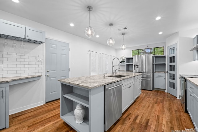 kitchen with visible vents, open shelves, recessed lighting, a sink, and appliances with stainless steel finishes