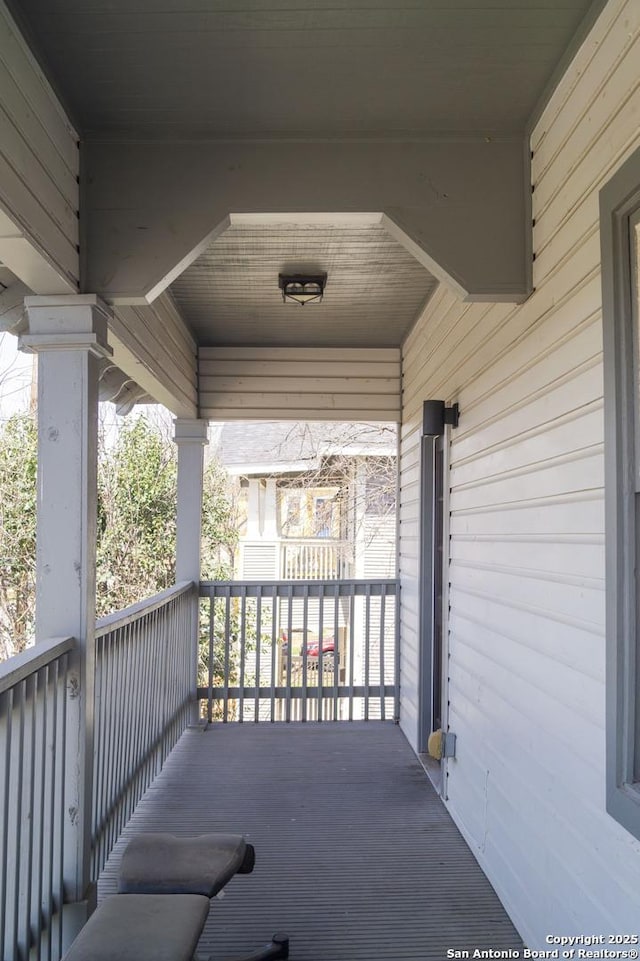 balcony featuring a porch