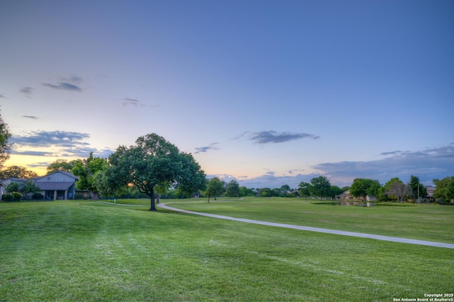 2408 Rock Crk, Kerrville, TX 78028 - yard at dusk featuring a yard