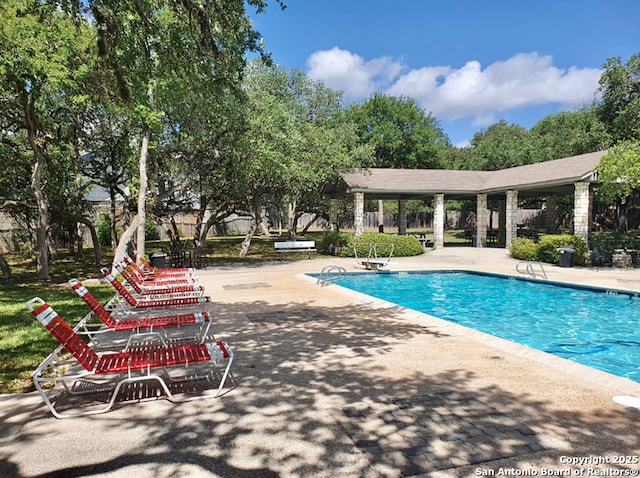 14834 Churchill Estates Blvd, San Antonio, TX 78248 - community pool with a patio area and view of scattered trees