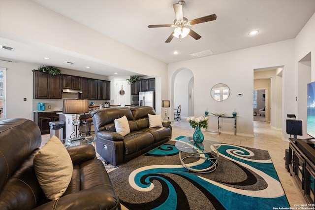 12007 White Riv, San Antonio, TX 78254 - living room with visible vents, arched walkways, recessed lighting, and a ceiling fan
