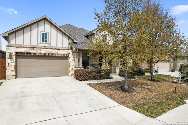 12007 White Riv, San Antonio, TX 78254 - view of front of home featuring a standing seam roof, roof with shingles, metal roof, stone siding, and driveway