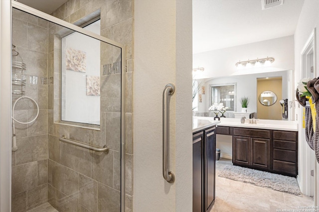 12007 White Riv, San Antonio, TX 78254 - full bathroom featuring vanity, visible vents, and a shower stall