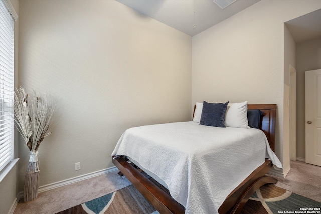 12007 White Riv, San Antonio, TX 78254 - carpeted bedroom featuring baseboards, multiple windows, and vaulted ceiling