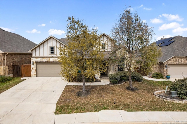 12007 White Riv, San Antonio, TX 78254 - view of front of property with stone siding, a garage, driveway, and stucco siding