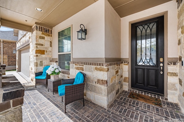 12007 White Riv, San Antonio, TX 78254 - entrance to property featuring stone siding, stucco siding, and a garage