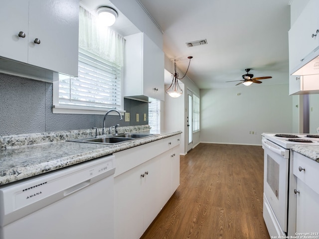 kitchen featuring a sink, ceiling fan, visible vents, white appliances, and white cabinets