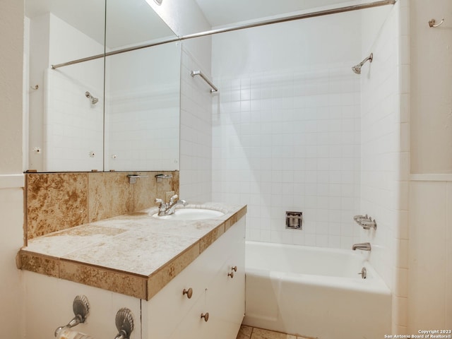 full bathroom with tasteful backsplash, vanity, and bathtub / shower combination