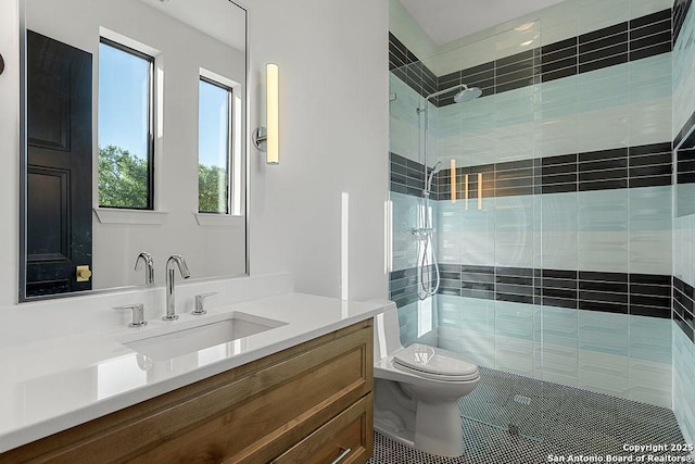 full bathroom with walk in shower, a healthy amount of sunlight, toilet, and vanity