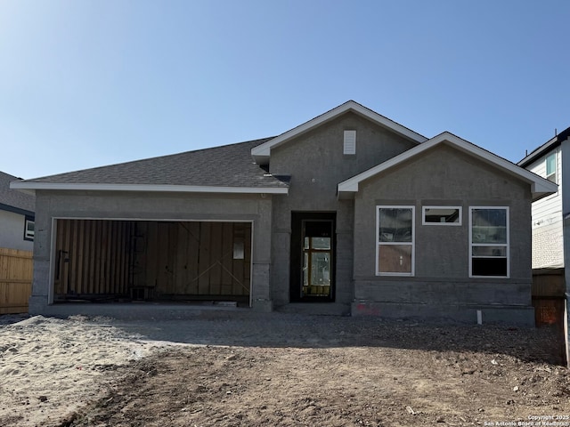9331 Pioneer Jct, San Antonio, TX 78254 - view of front facade featuring an attached garage, driveway, and a shingled roof