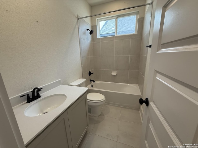 9331 Pioneer Jct, San Antonio, TX 78254 - bathroom with a textured wall, vanity, bathing tub / shower combination, and tile patterned flooring