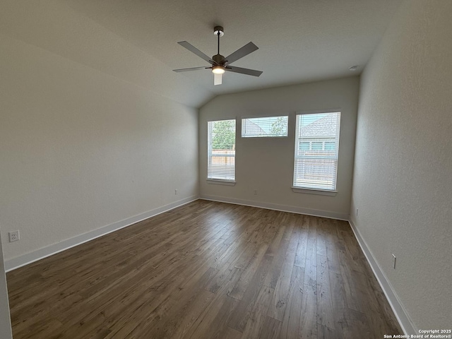 9331 Pioneer Jct, San Antonio, TX 78254 - unfurnished room featuring a ceiling fan, dark wood finished floors, and lofted ceiling