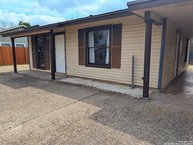exterior space featuring fence