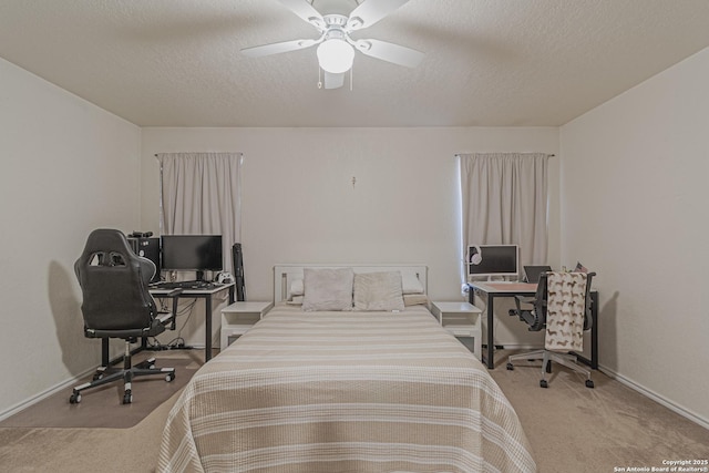 4907 Heather Pass, San Antonio, TX 78218 - bedroom with baseboards, a textured ceiling, a ceiling fan, and carpet