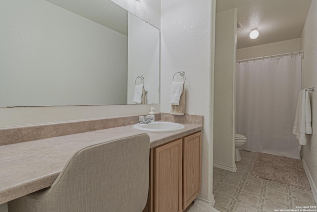 4907 Heather Pass, San Antonio, TX 78218 - bathroom featuring a shower with curtain, tile patterned floors, toilet, and vanity