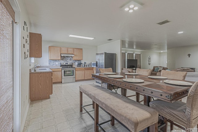 4907 Heather Pass, San Antonio, TX 78218 - dining space with light floors and visible vents