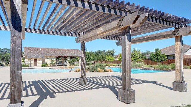 143 Lukas Cv, San Antonio, TX 78253 - community pool featuring fence, a pergola, and a patio area
